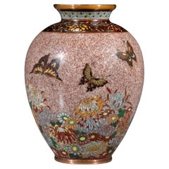 A silver-wire cloisonné vase with butterflies and chrysanthemums