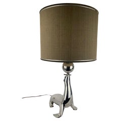 A silvered seal as a table lamp