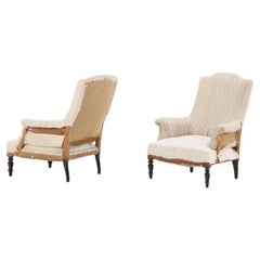 A similar pair of French Napoleon III library chairs circa 1860