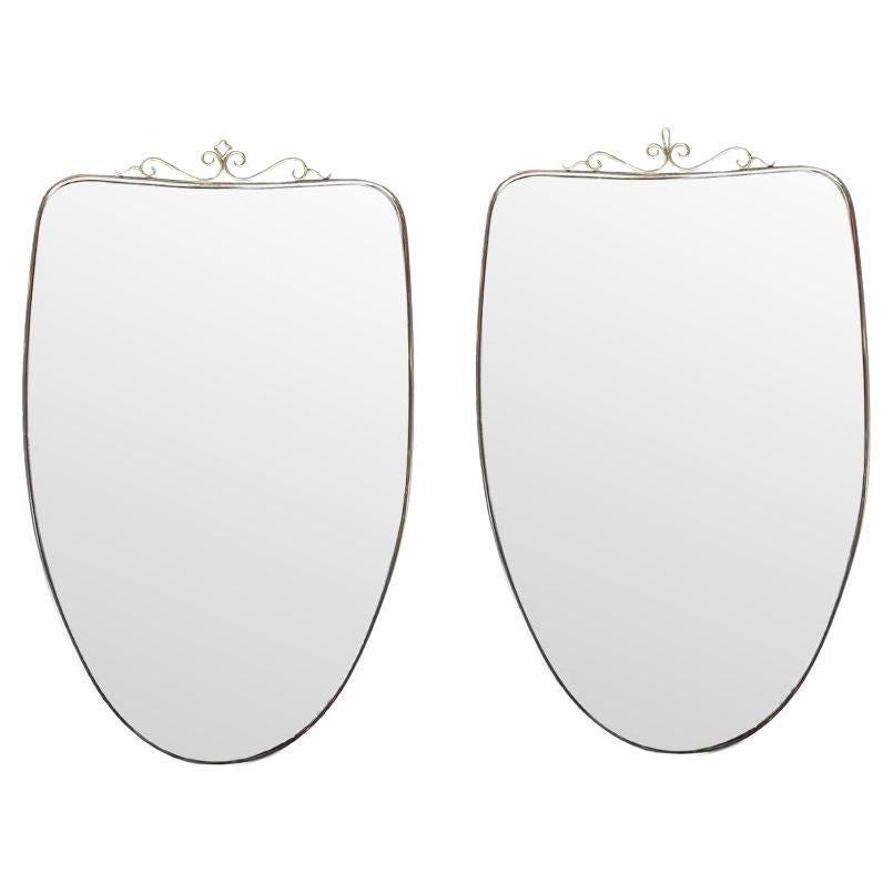 Similar Pair of Original 1960s Italian Shield Mirrors with Scroll Top Detail