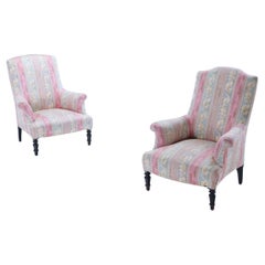 A similiar pair of French Napoleon III library chairs circa 1860