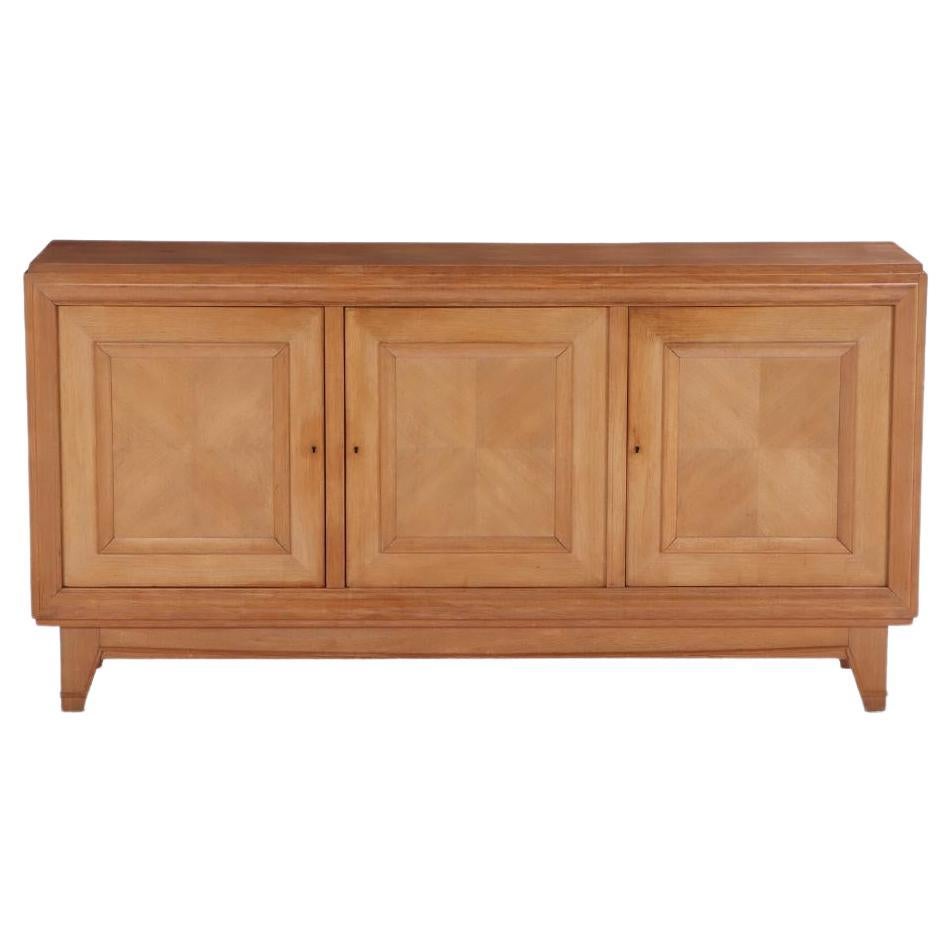 A simple and elegant French oak sideboard, C. 1940.