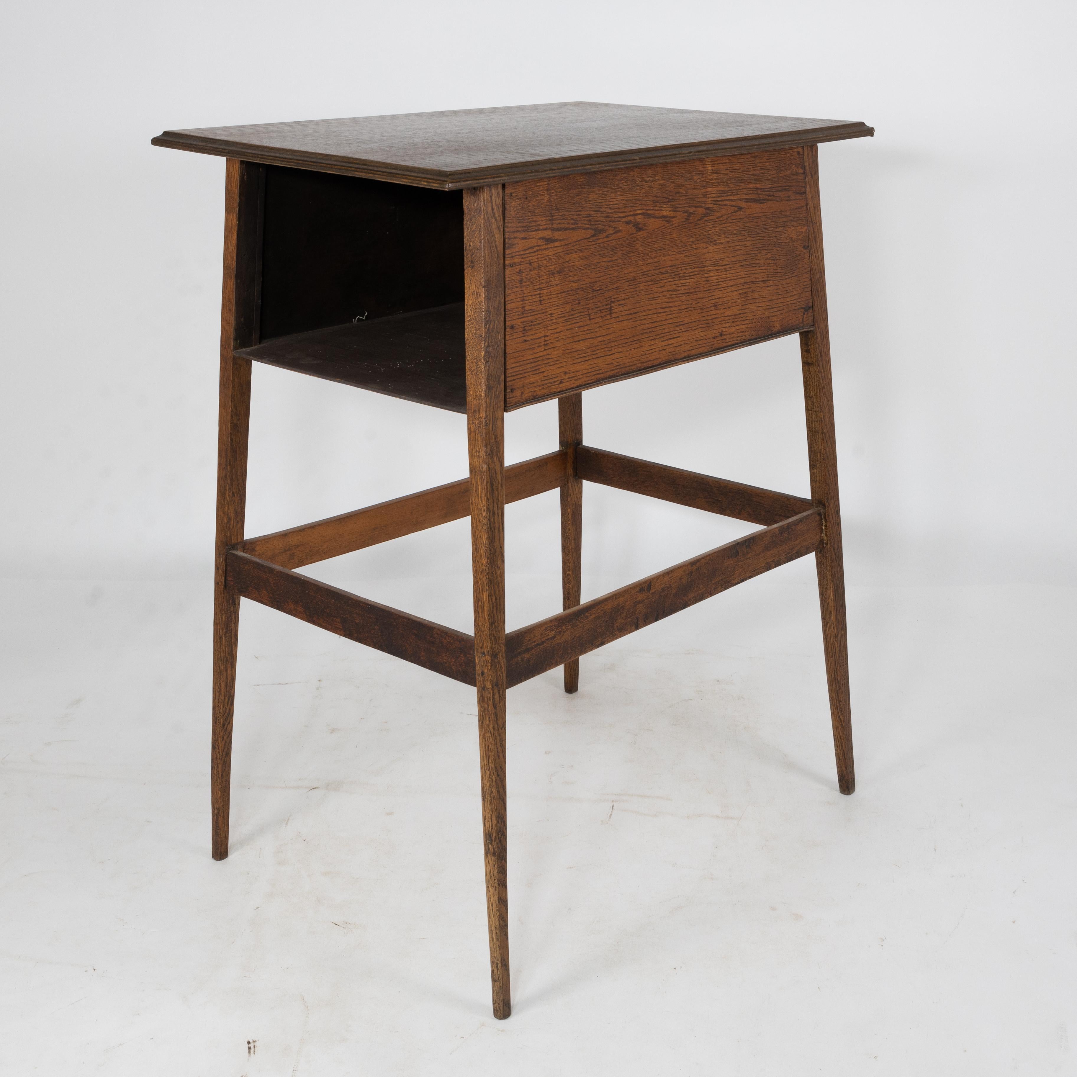 English A simple oak oblong side or bedside table with a moulded edge to the top For Sale
