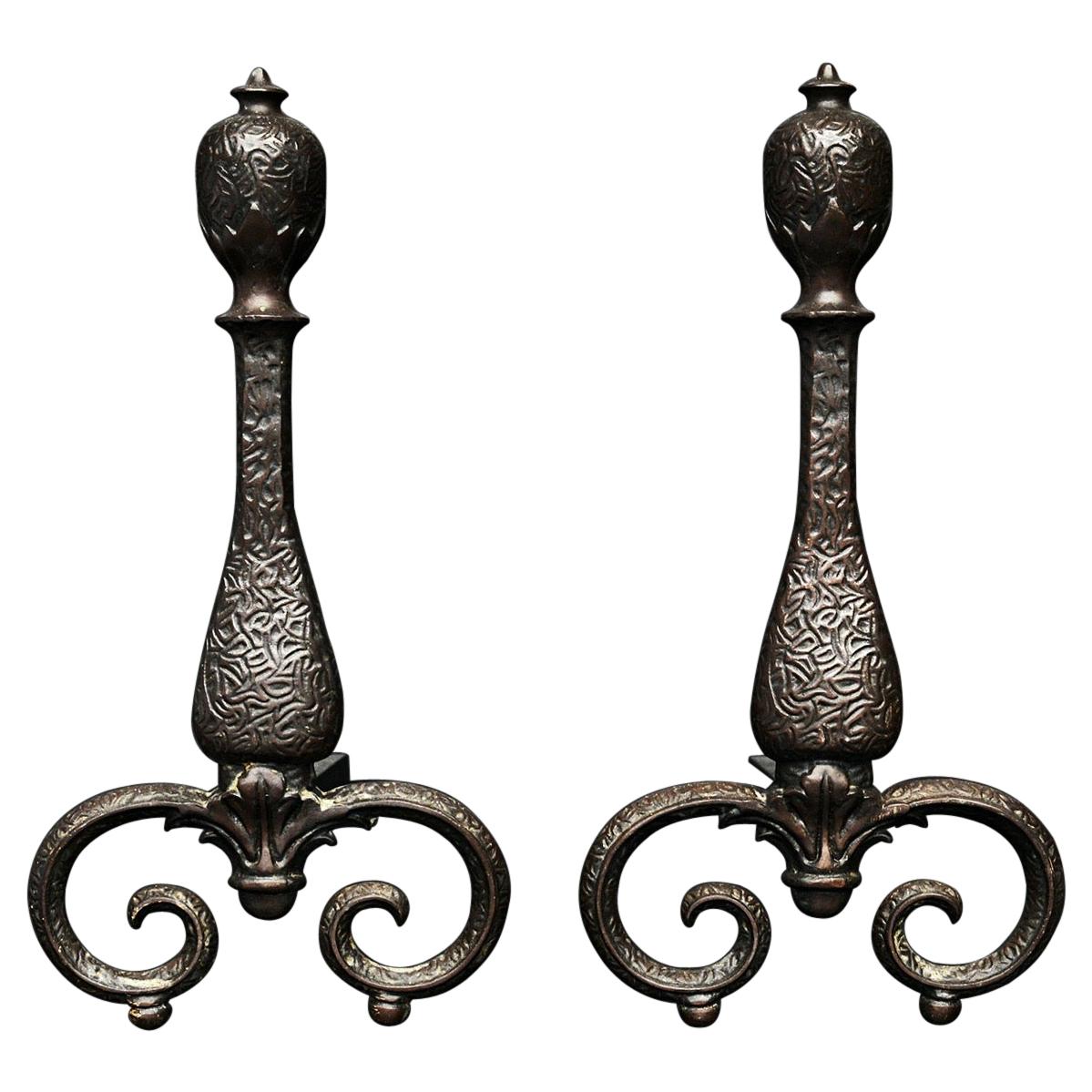 A Decorative Pair of Iron Firedogs For Sale