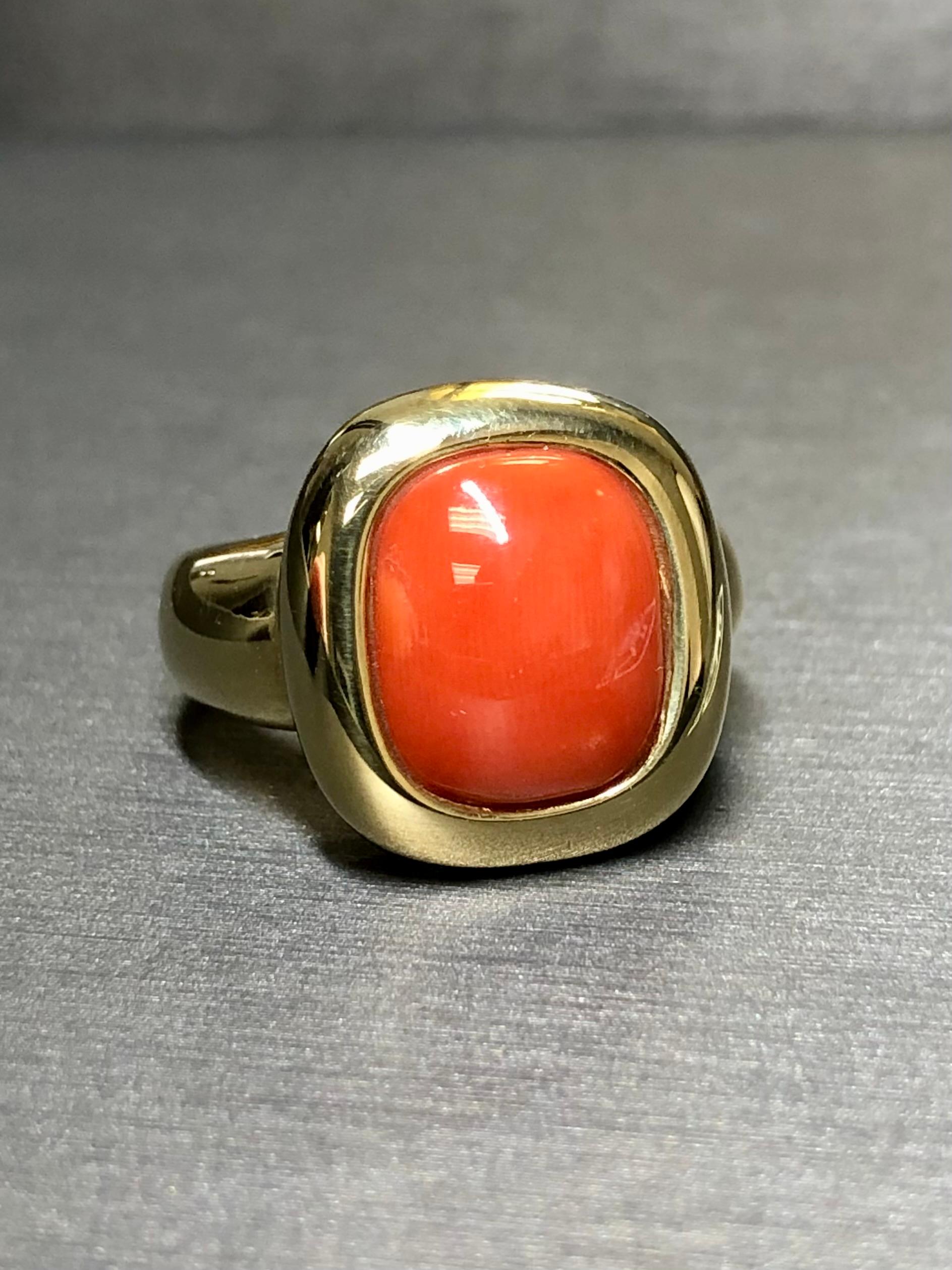 
A simple yet bold statement ring done in high polished 18K yellow gold and centered but a beautifully high polished cushion shaped cabochon red coral. A classic look sure to stand the test of time.


Dimensions/Weight:

Ring measures .70” x .60”