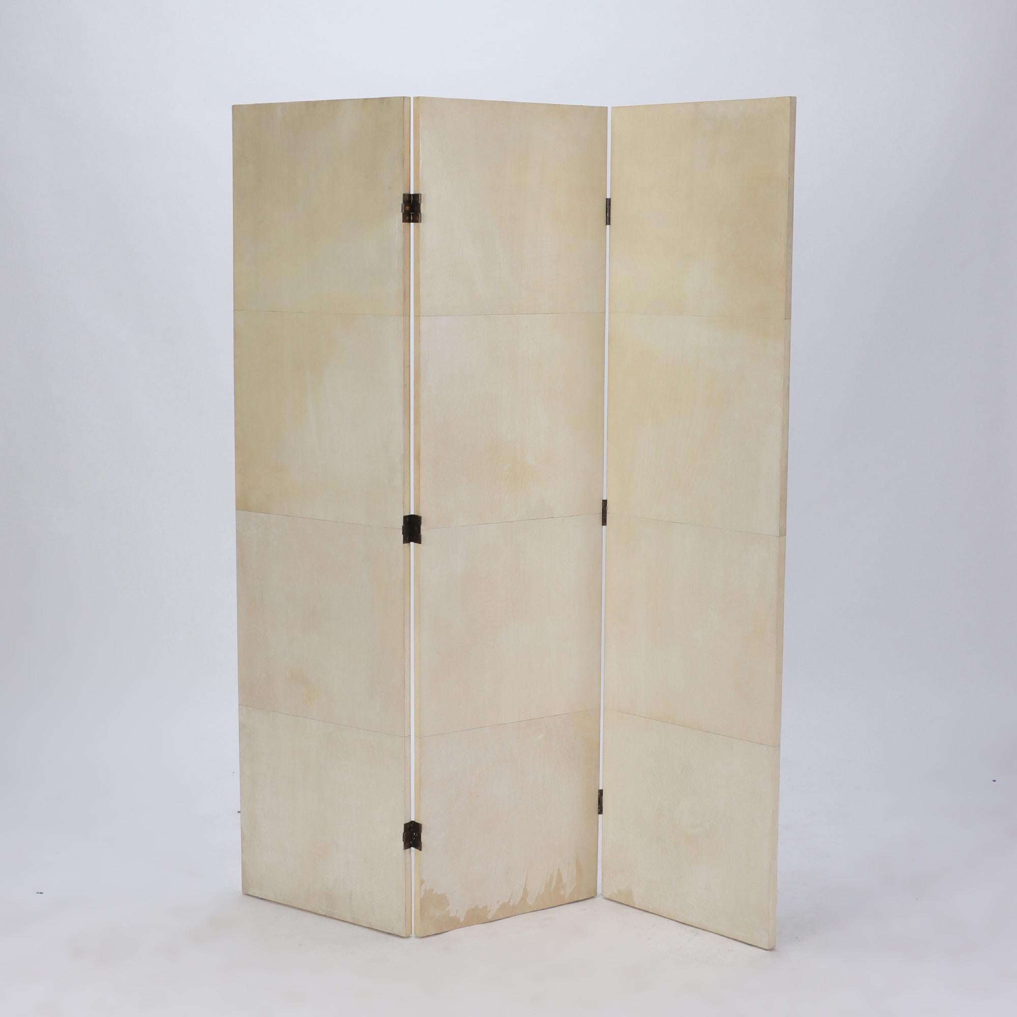 A parchment covered three panel folding screen. Contemporary. Available in custom made sizes.
Each screen is 58.5