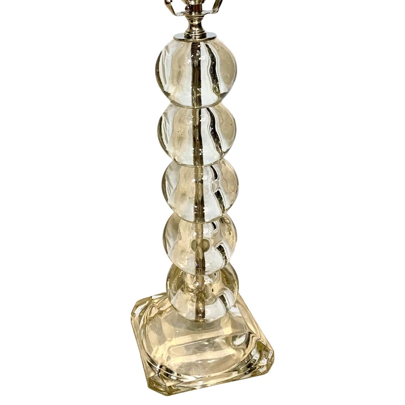 A circa 1920's French glass ball table lamp with square glass base.

Measurements:
Height of body: 13.5