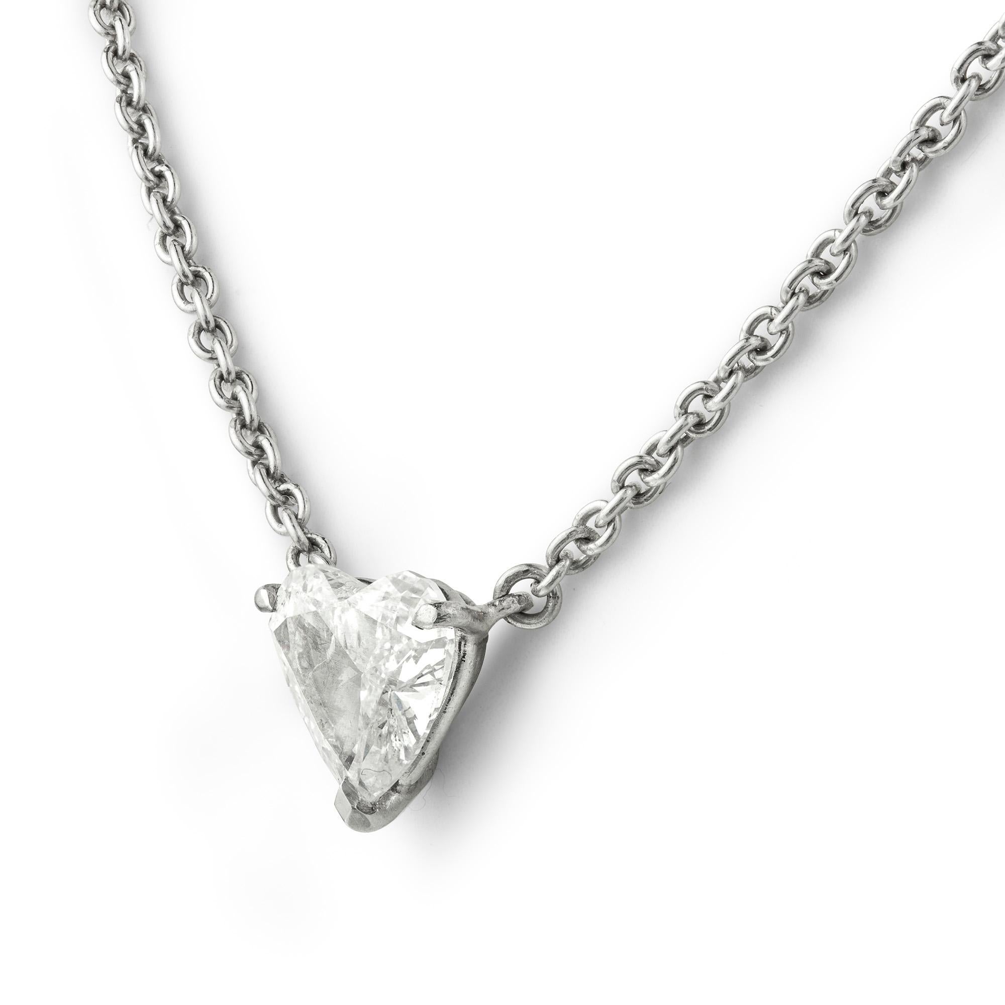 A single stone diamond pendant, the heart shaped diamond weighing 0.95 carats, E colour and I1 Clarity accompanied with AnchorCert certificate , claw-set to a platinum mount and 16