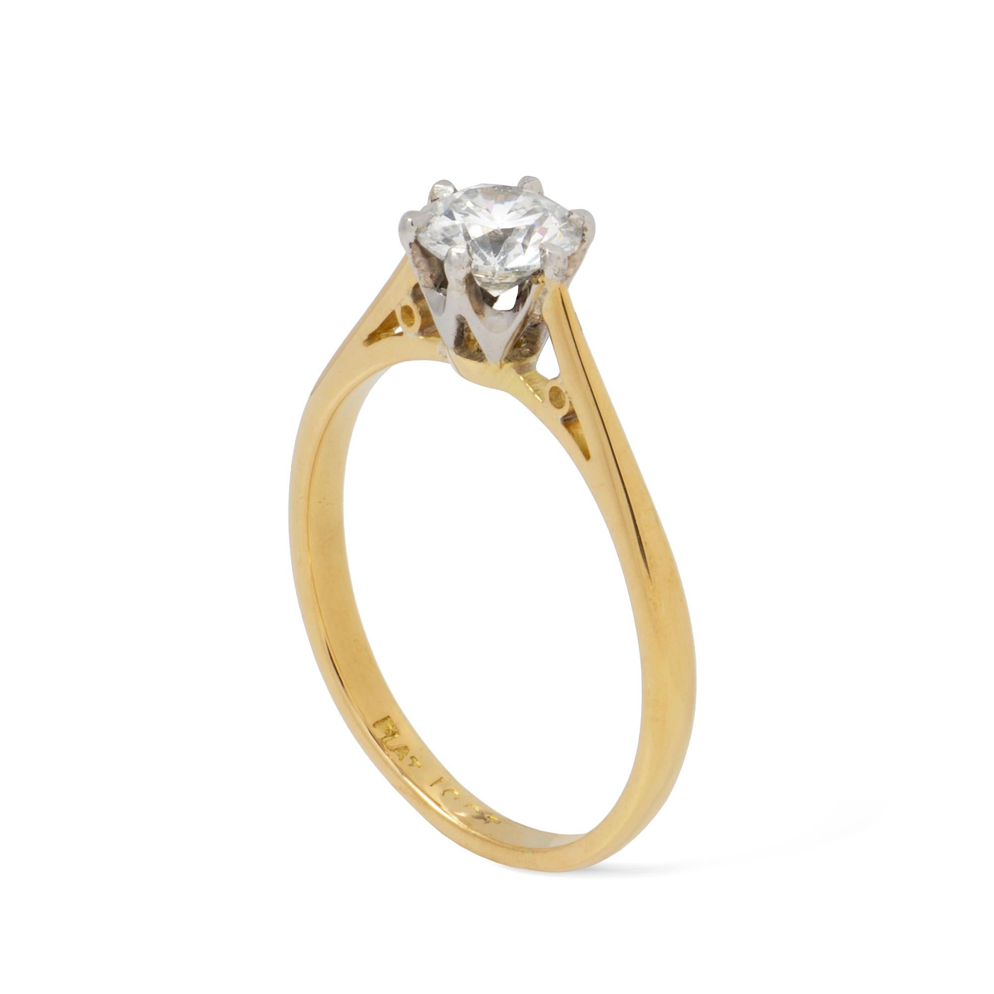 A single stone diamond ring, the round brilliant-cut diamond weighing 0.66 carats, claw-set to a platinum rex-design collet, to yellow gold mount, later hallmarked London 2019, bearing Bentley & Skinner sponsor mark, gross weight 2.4 grams. 

This
