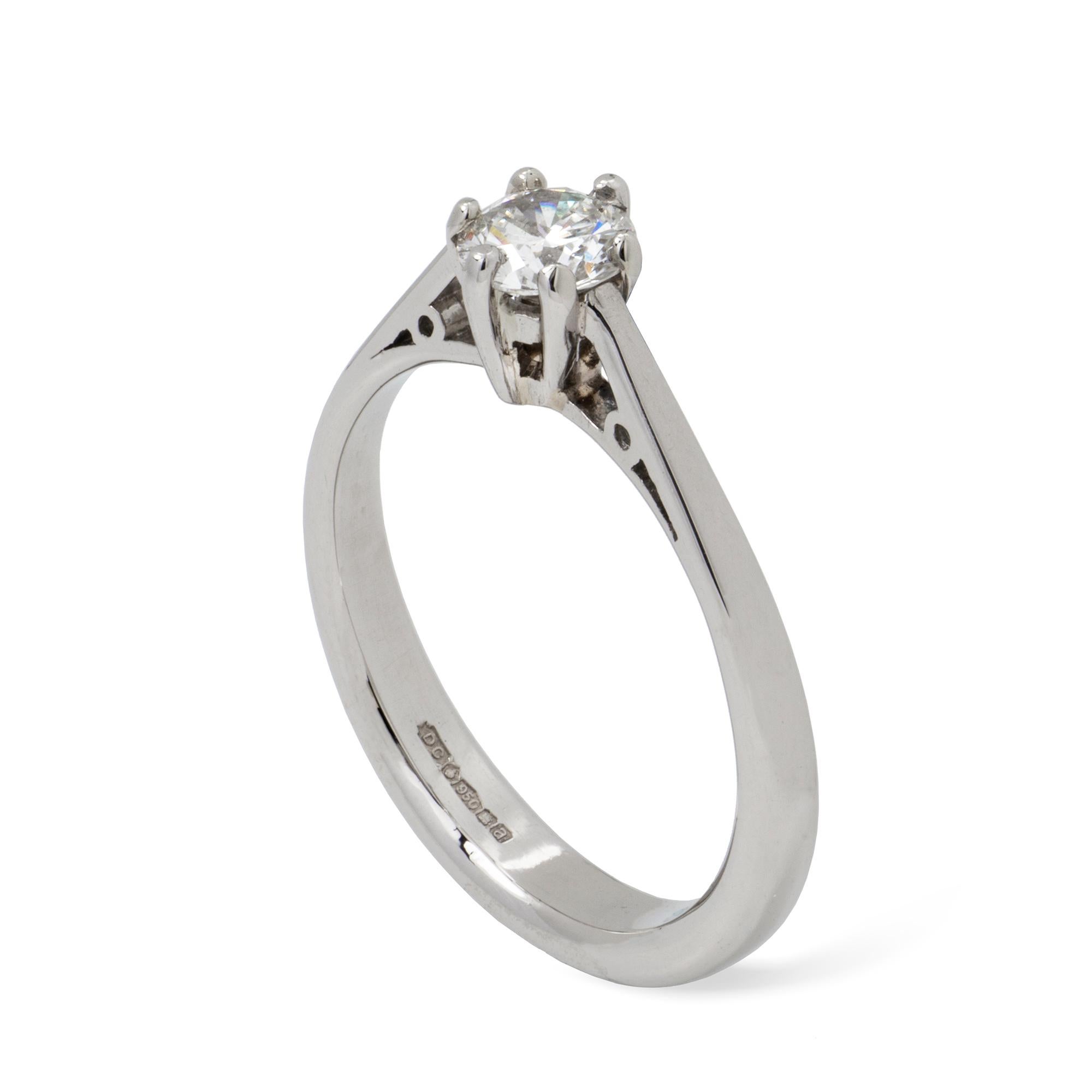A single stone diamond solitaire ring, the round brilliant cut diamond weighing 0.44 carats, assessed H-I colour SI Clarity, six claws set to a platinum tapering shank with shaniers details, hallmarked Platinum 950, Edinburgh, 2000, gross weight