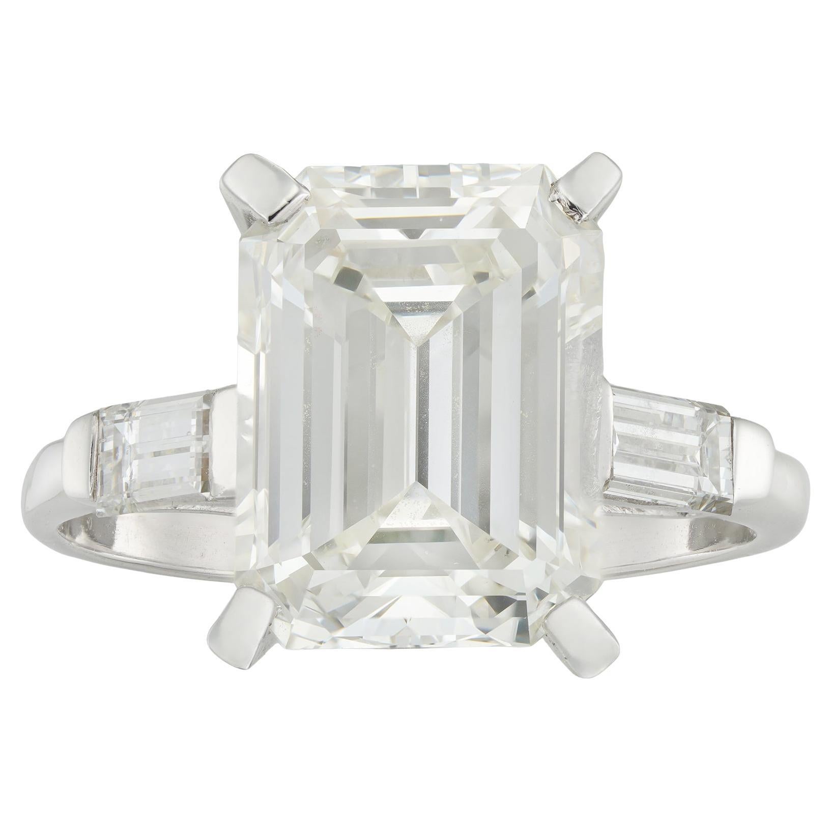 A single stone emerald-cut diamond ring
