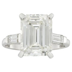 A single stone emerald-cut diamond ring