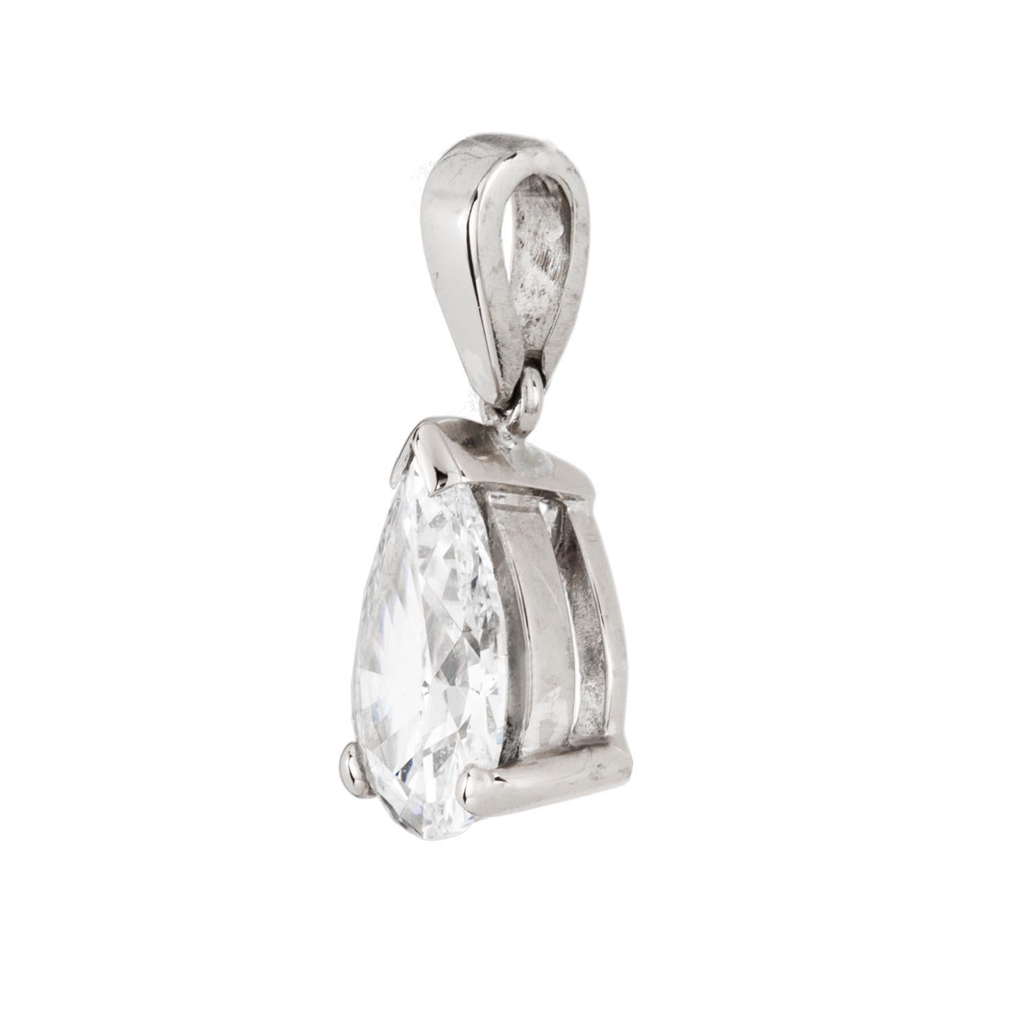 A single stone diamond pendant, the pear-cut diamond weighing 0.71 carats, accompanied by AnchorCert Report, stating to be of F colour SI1 clarity, claw-set in white gold mount suspended by a pendant loop, hallmarked 18ct white gold, London 2013,