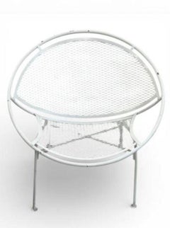 A single white "Radar Hoop" chair