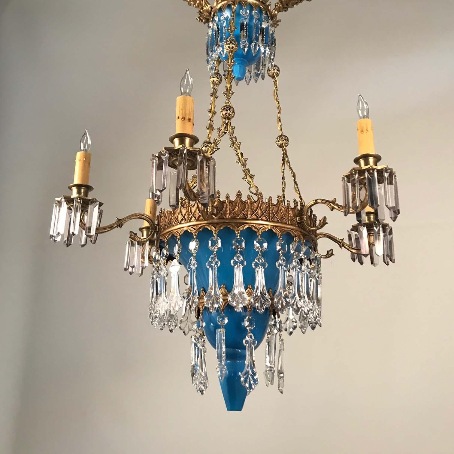 This fine French chandelier brings the best to your home. From the gilt bronze crisply cast canopy, to the cut blue glass pendant below, it demonstrates the good taste and quality for which Baccarat is renowned but cannot be definitively attributed
