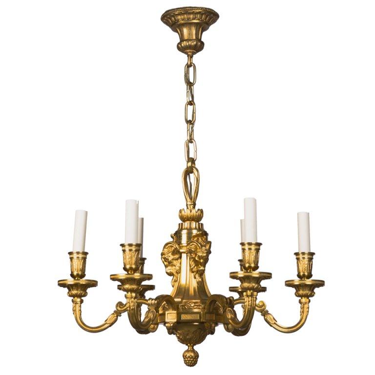 Six Arm Gilded Bronze Chandelier with Ram's Heads and Foliate Details, ca 1910s For Sale