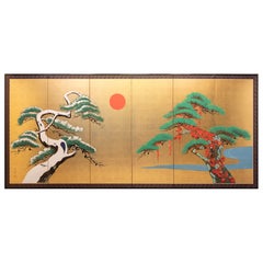 A six-panel folding screen with pine trees beneath the red sun
