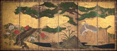 A six-panel Kano-school gold-leaf screen depicting cranes beneath a majestic pine tree