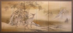 A six-panel screen depicting a pair of deer in a winter landscape