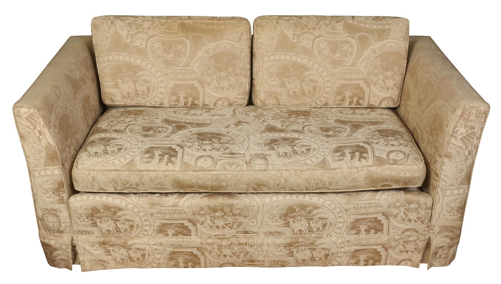 We love this piece for its simplicity. This tailored loveseat had a loose back with two cushions, slender high arms and one seat cushion. Upholstered in a neutral damask, this understated piece could go anywhere--at the foot of a bed, in a living