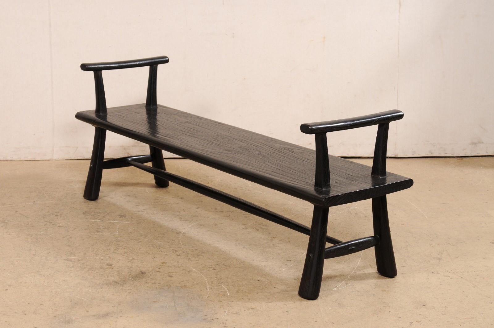 A Sleek and Sophisticated 5.75' Ebonized Teak Bench, Beautifully Artisan Crafted For Sale 5