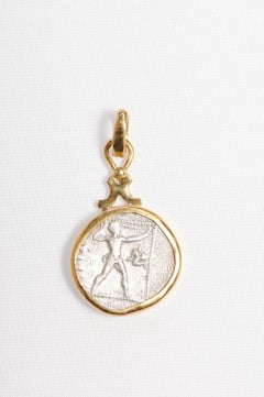 A "Slinger" & Wrestlers Coin Pendant