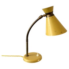A Small 1950's French Desk Light With Articulated Brass Neck