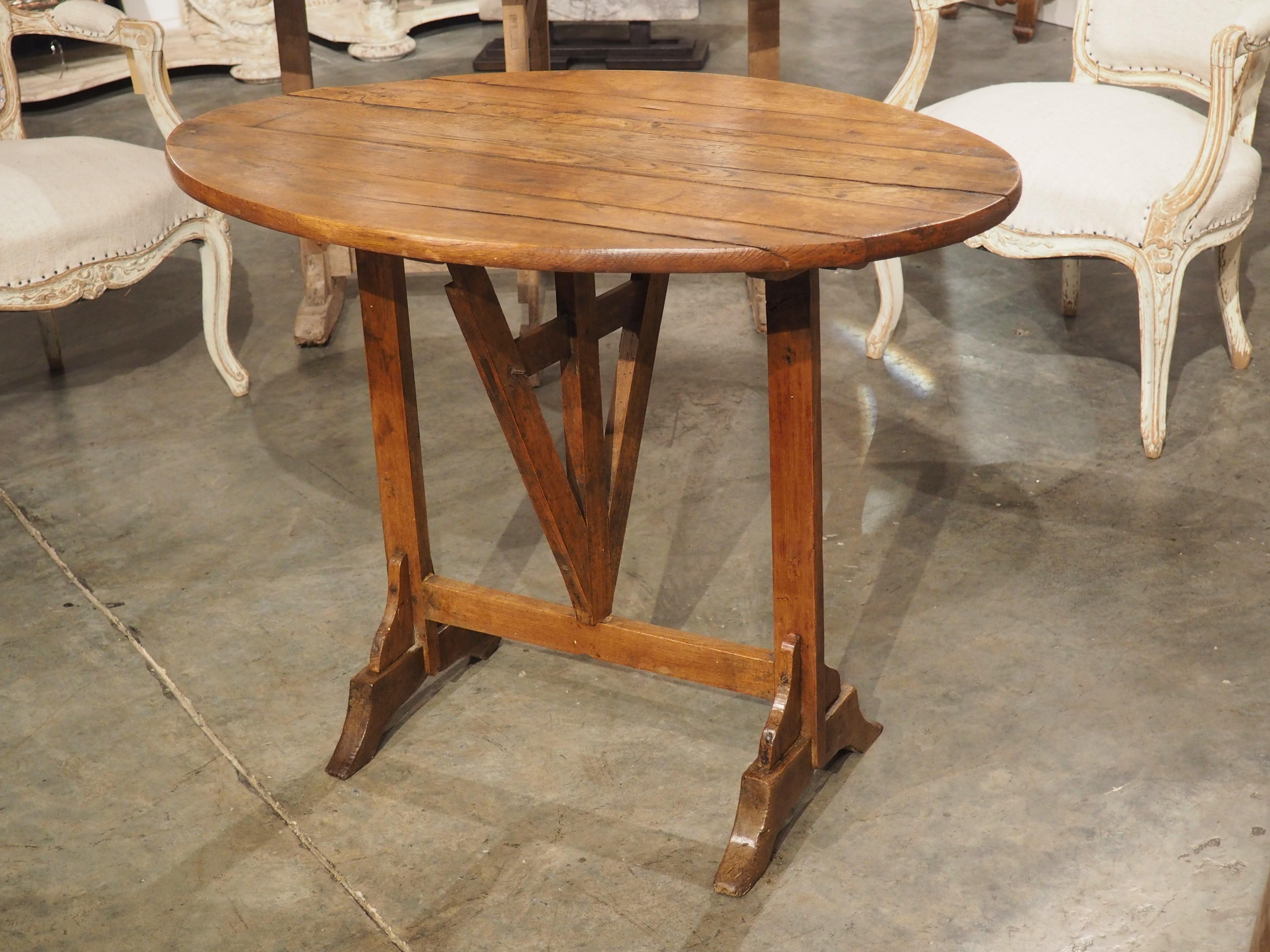 A Small 19th Century Carved Oak Tilt-Top Wine Tasting Table from France 9