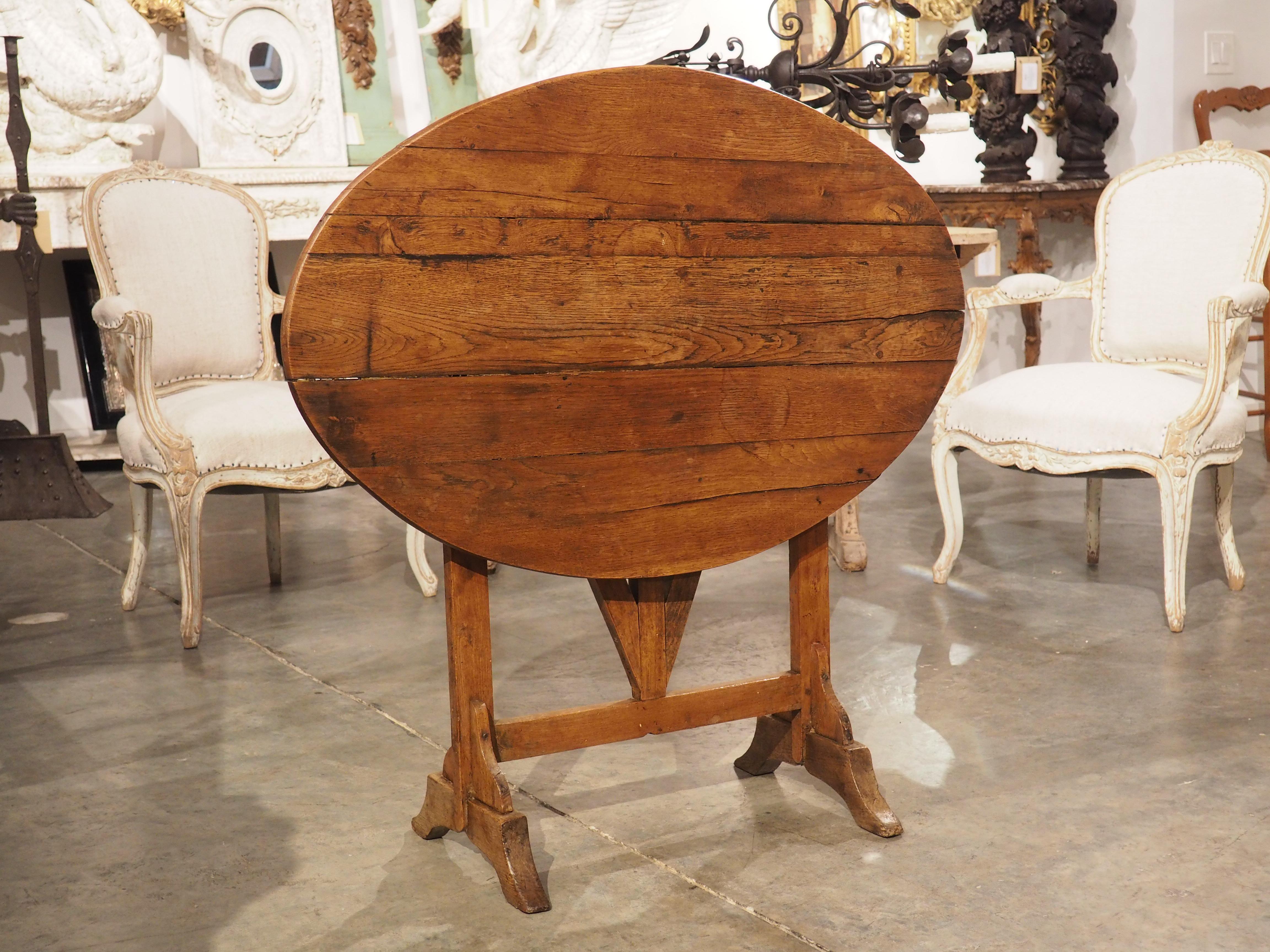 French A Small 19th Century Carved Oak Tilt-Top Wine Tasting Table from France