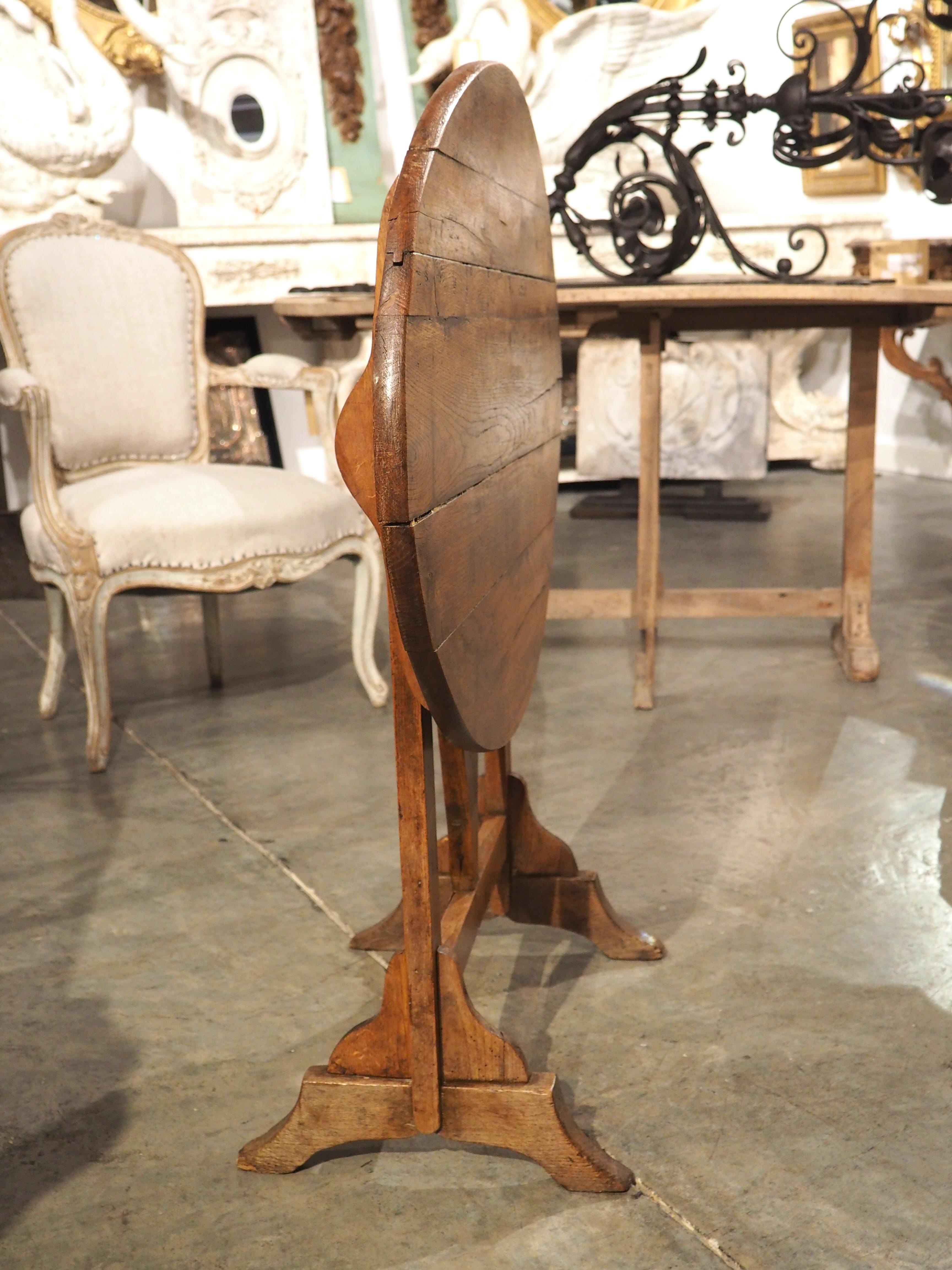 A Small 19th Century Carved Oak Tilt-Top Wine Tasting Table from France In Good Condition In Dallas, TX