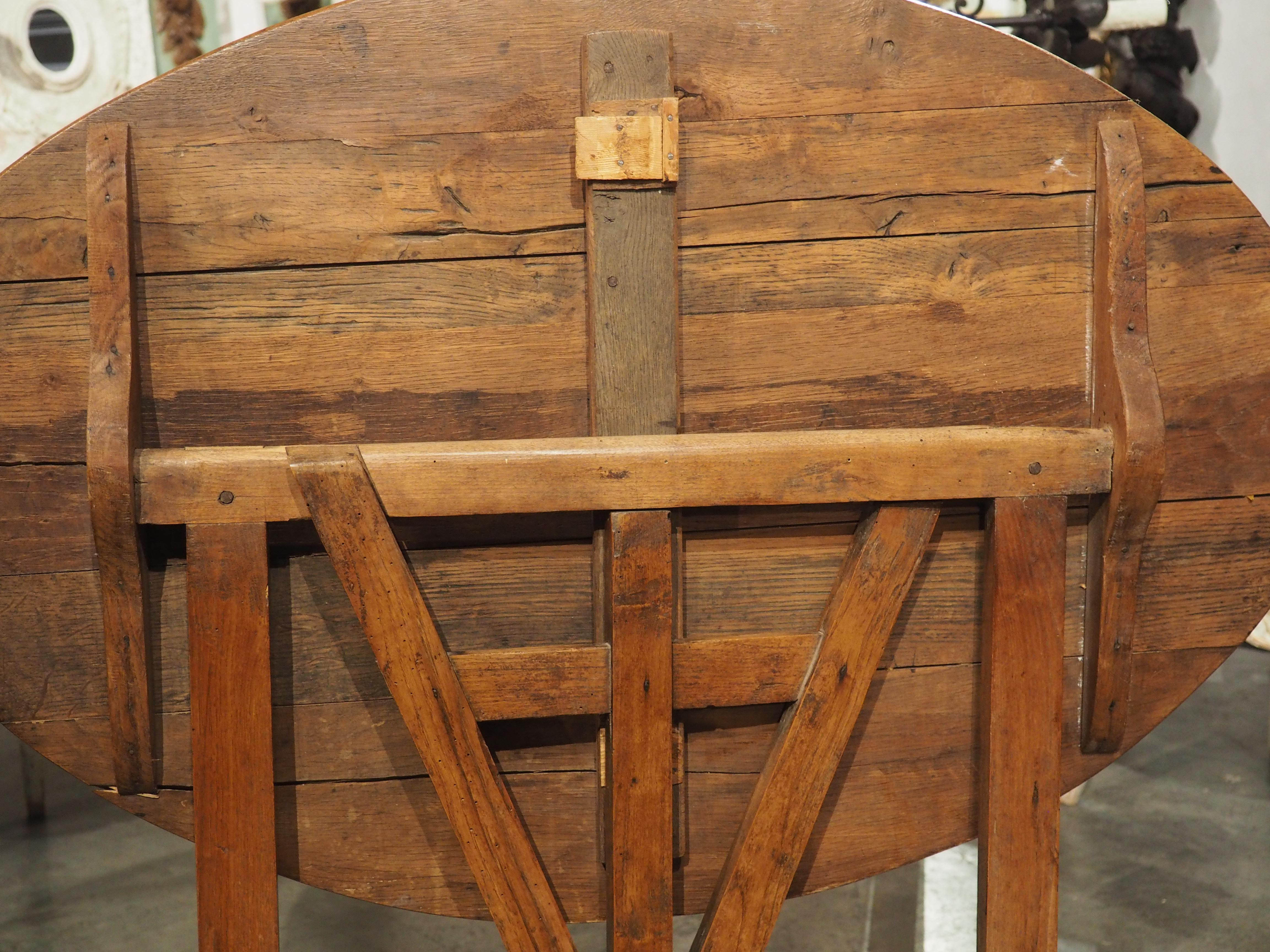A Small 19th Century Carved Oak Tilt-Top Wine Tasting Table from France 2
