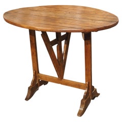 A Small 19th Century Carved Oak Tilt-Top Wine Tasting Table from France