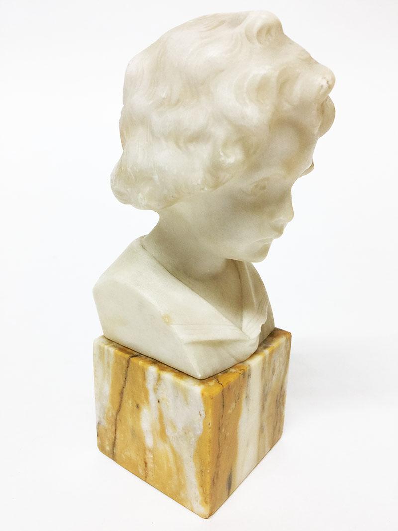 A small alabaster bust on marble base by German Daniel Greiner (1872-1943),
circa 1900, a bust of a boy made of alabaster
Daniel Greiner a German sculptor
Singed, reverse body

The measurements are 19 cm high, 8 cm wide and the depth is 9
