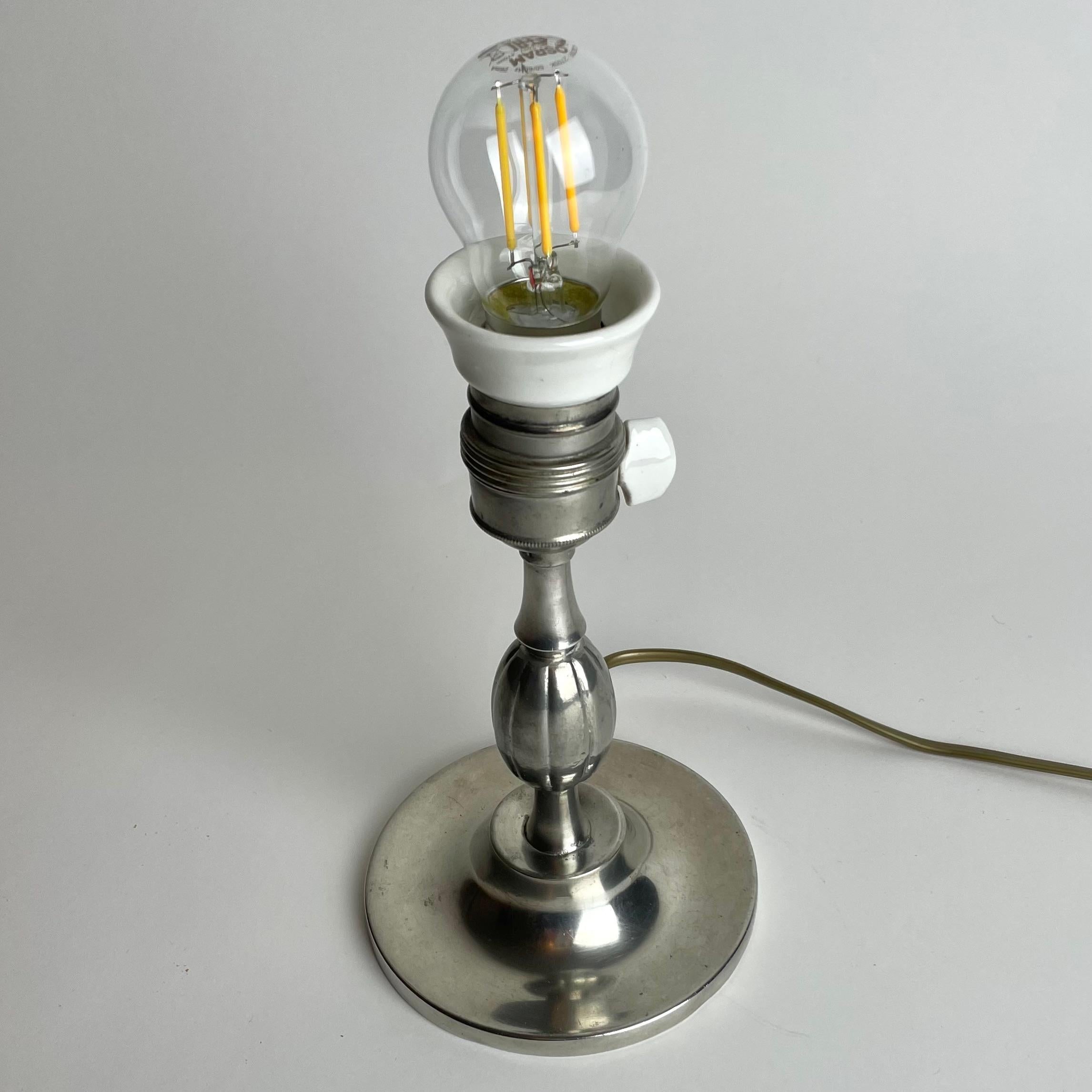 A small and elegant Table Lamp in Pewter Swedish Grace from the year 1930. In Good Condition For Sale In Knivsta, SE