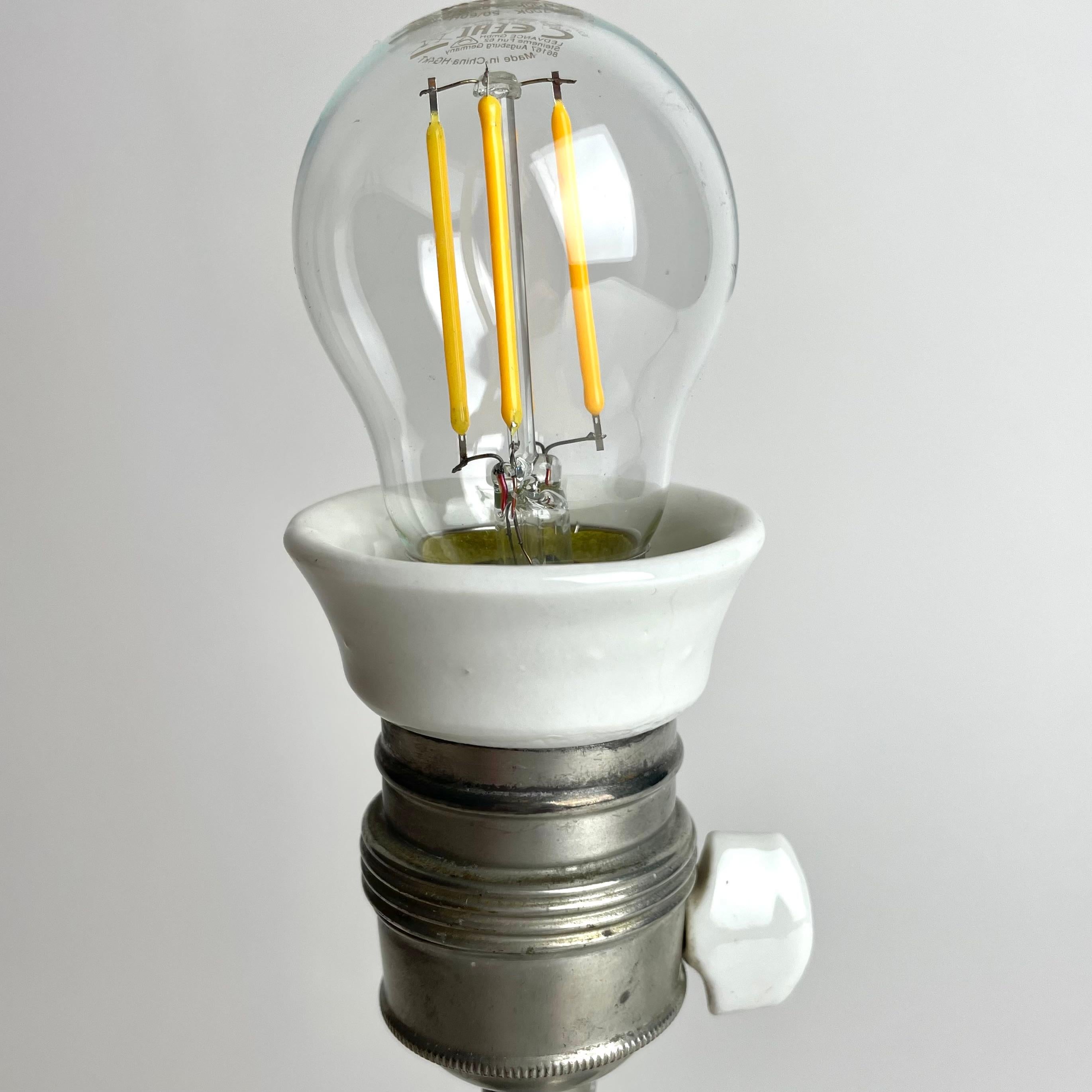 A small and elegant Table Lamp in Pewter Swedish Grace from the year 1930. For Sale 3
