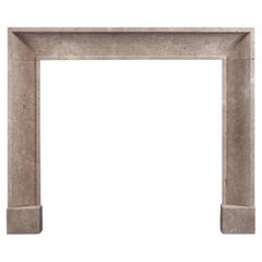 A Small Architectural Fireplace in Travertine Stone