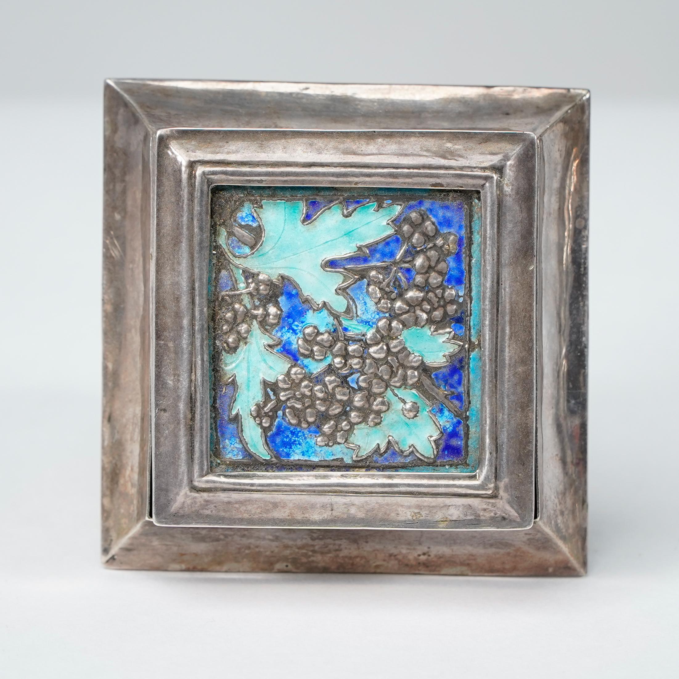 English A small Arts and Crafts silver plated jewellery box with enamel decoration For Sale