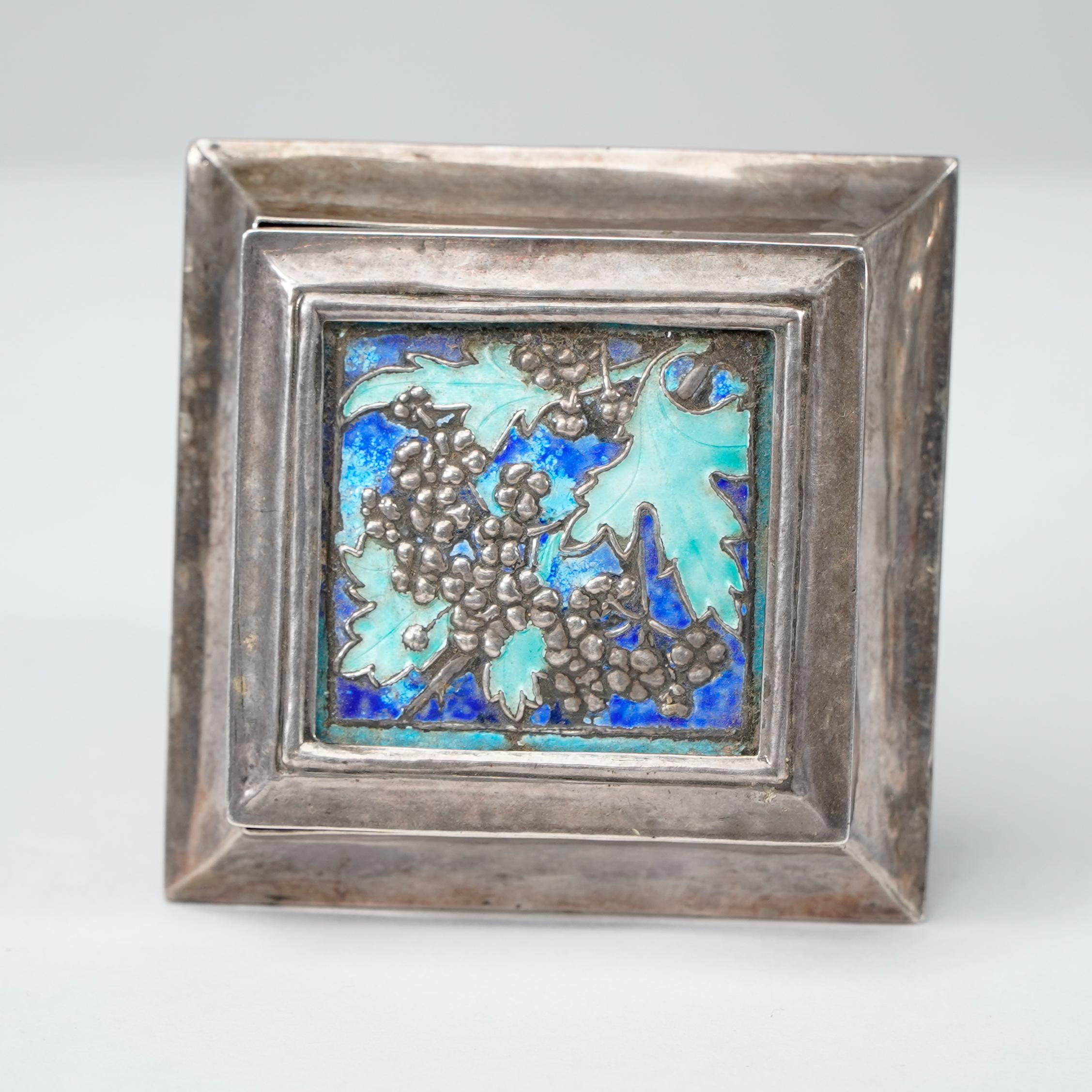 Early 20th Century A small Arts and Crafts silver plated jewellery box with enamel decoration For Sale