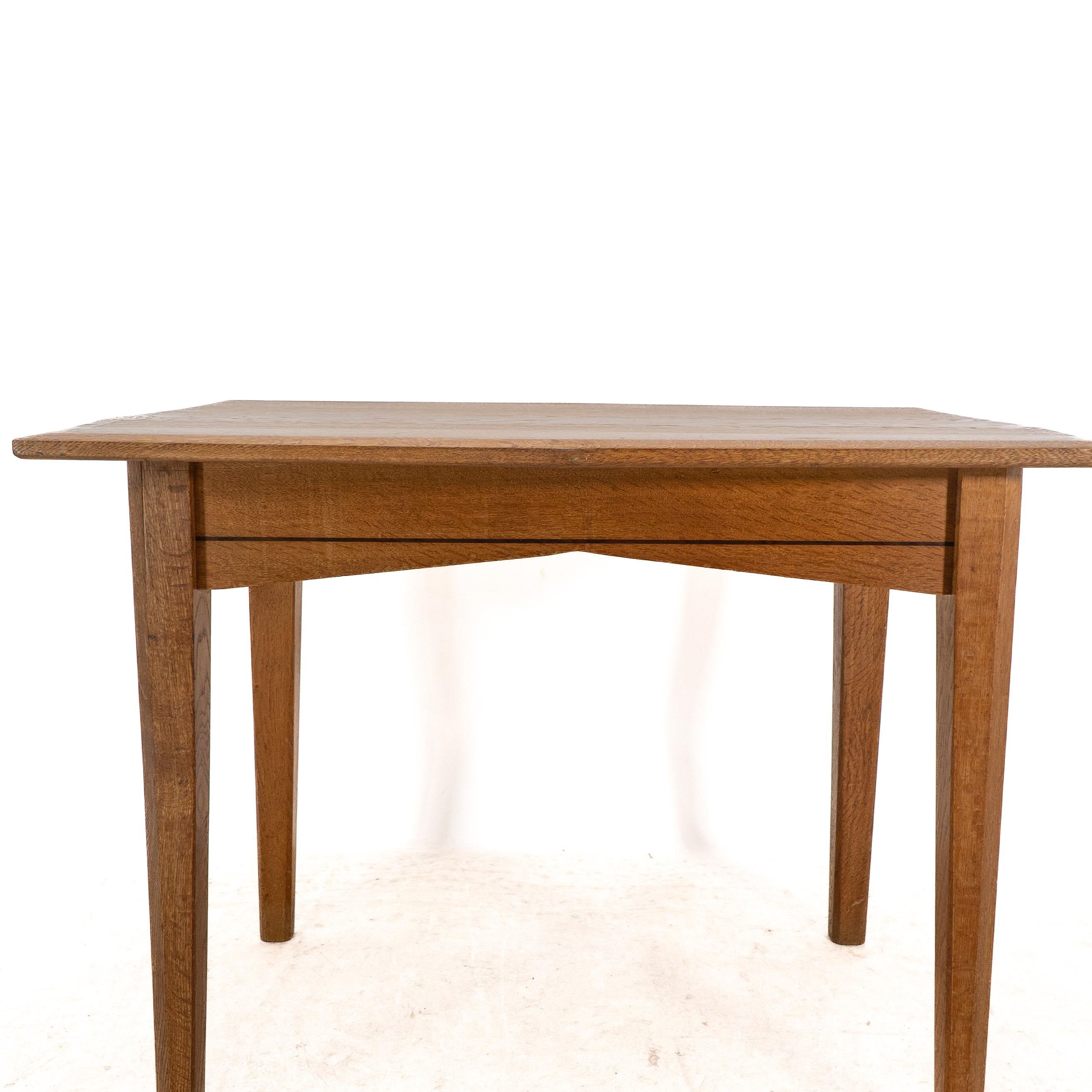 A small Arts & Crafts Cotswold style oak dining or centre table angular designs For Sale 4