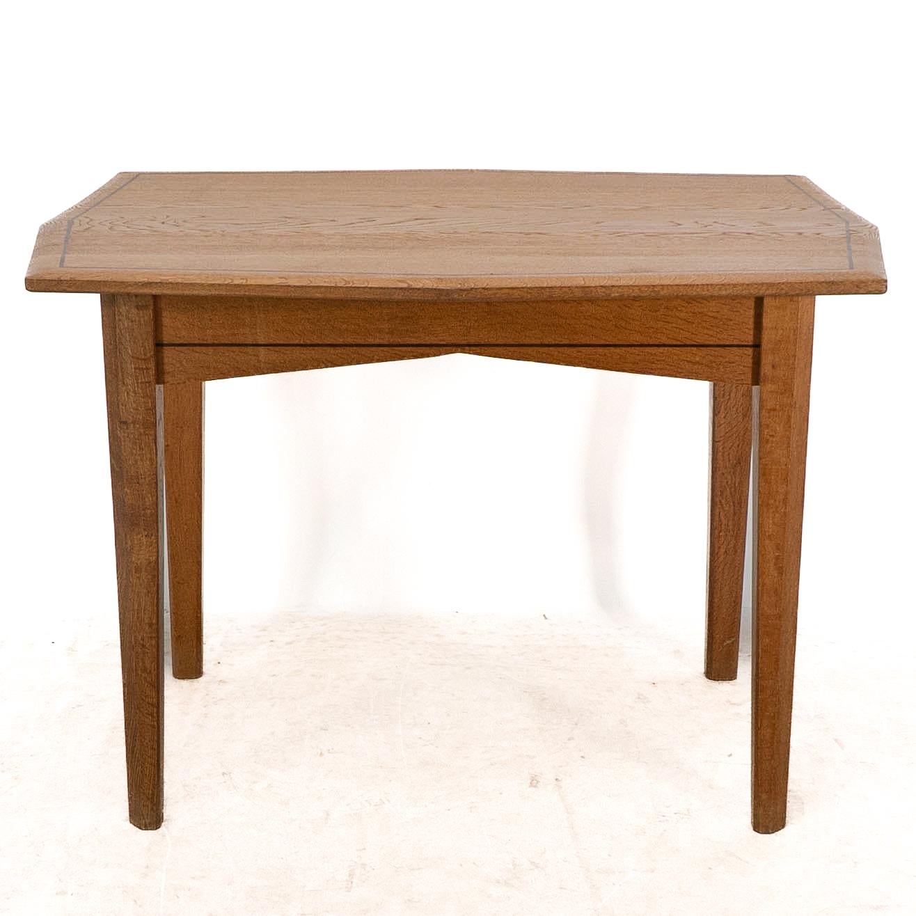 A small Arts & Crafts Cotswold style oak dining or centre table angular designs In Good Condition For Sale In London, GB
