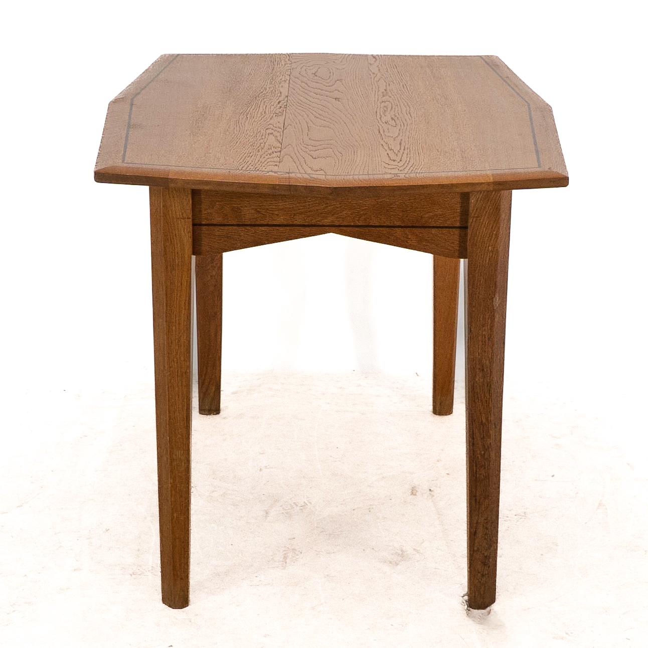 Oak A small Arts & Crafts Cotswold style oak dining or centre table angular designs For Sale