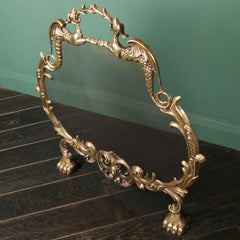 A Small Brass Fireplace Fire Screen with Dragons