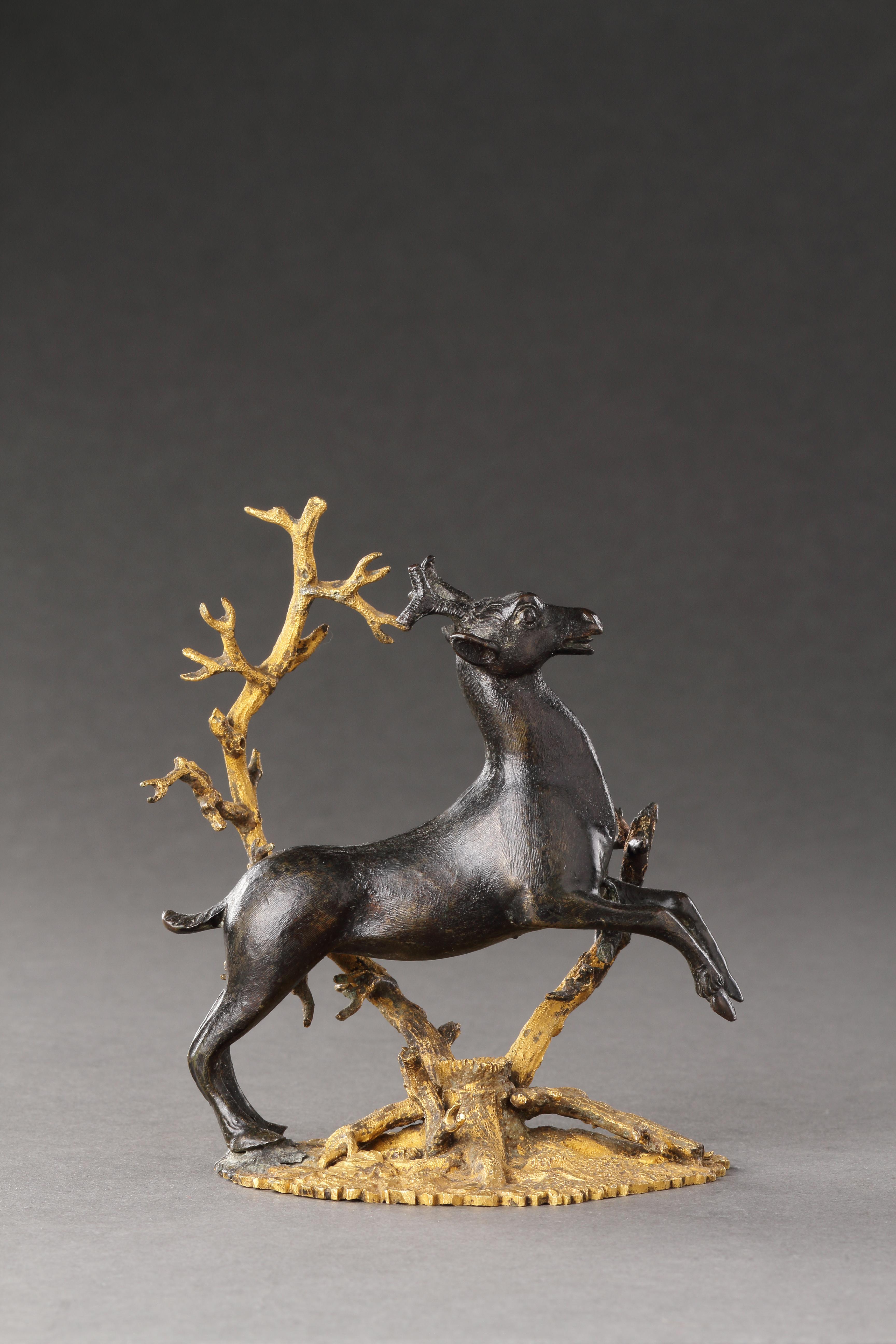 A Small Bronze Group of a Prancing Stag
Bronze, gilt bronze
South Germany; Nuremberg or Augsburg
Late 17th Century / Circa 1620

SIZE: 12cm high - 4¾ ins high

This bronze group, made in southern Germany, bears great similarities with the gilded