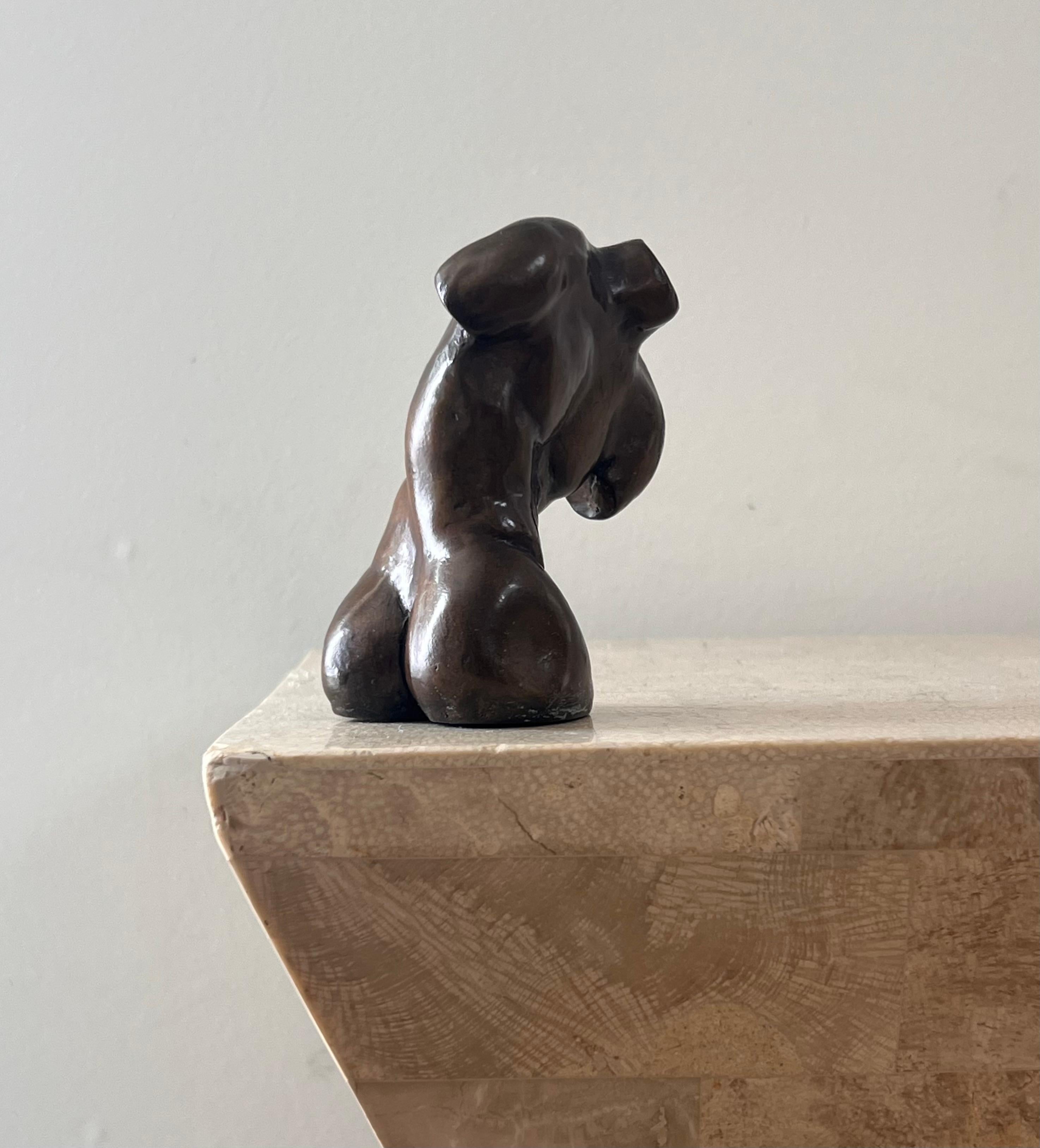 20th Century A small bronze sculpture of a male bust, 20th century