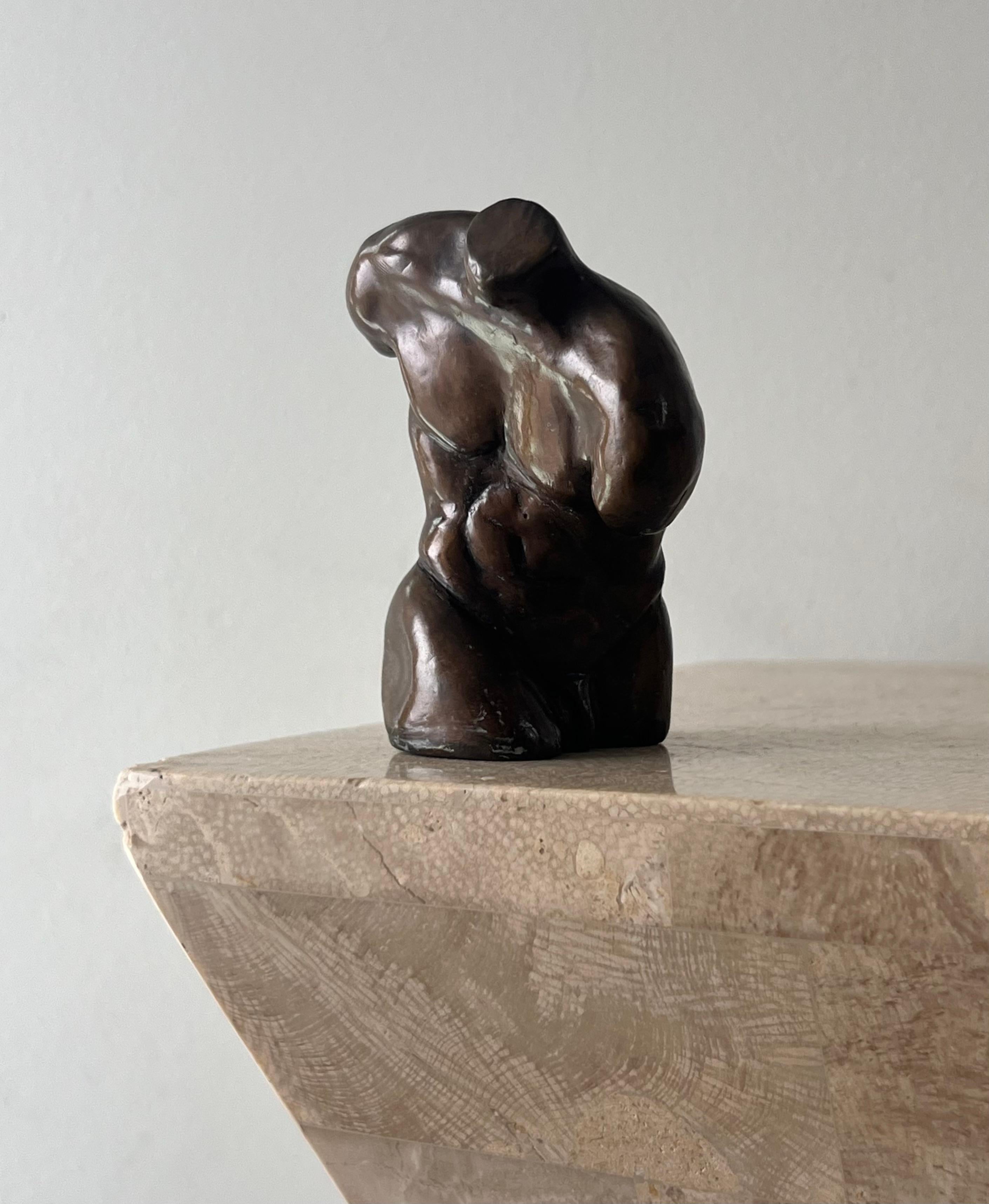 A small bronze sculpture of a male bust, 20th century 1