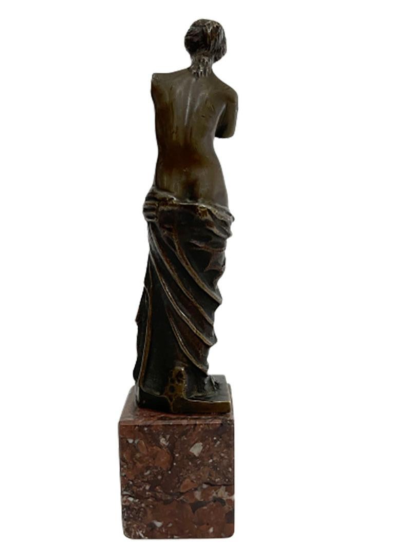 small bronze statues