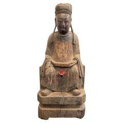 A Small Chinese Carved Timber Gilt and Polychrome Figure, Ming Dynasty