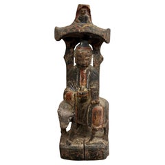 A Small Chinese Carved Timber Polychrome Figure, Ming Dynasty