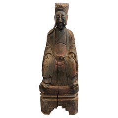 A Small Chinese Carved Timber Polychrome Figure, Ming Dynasty