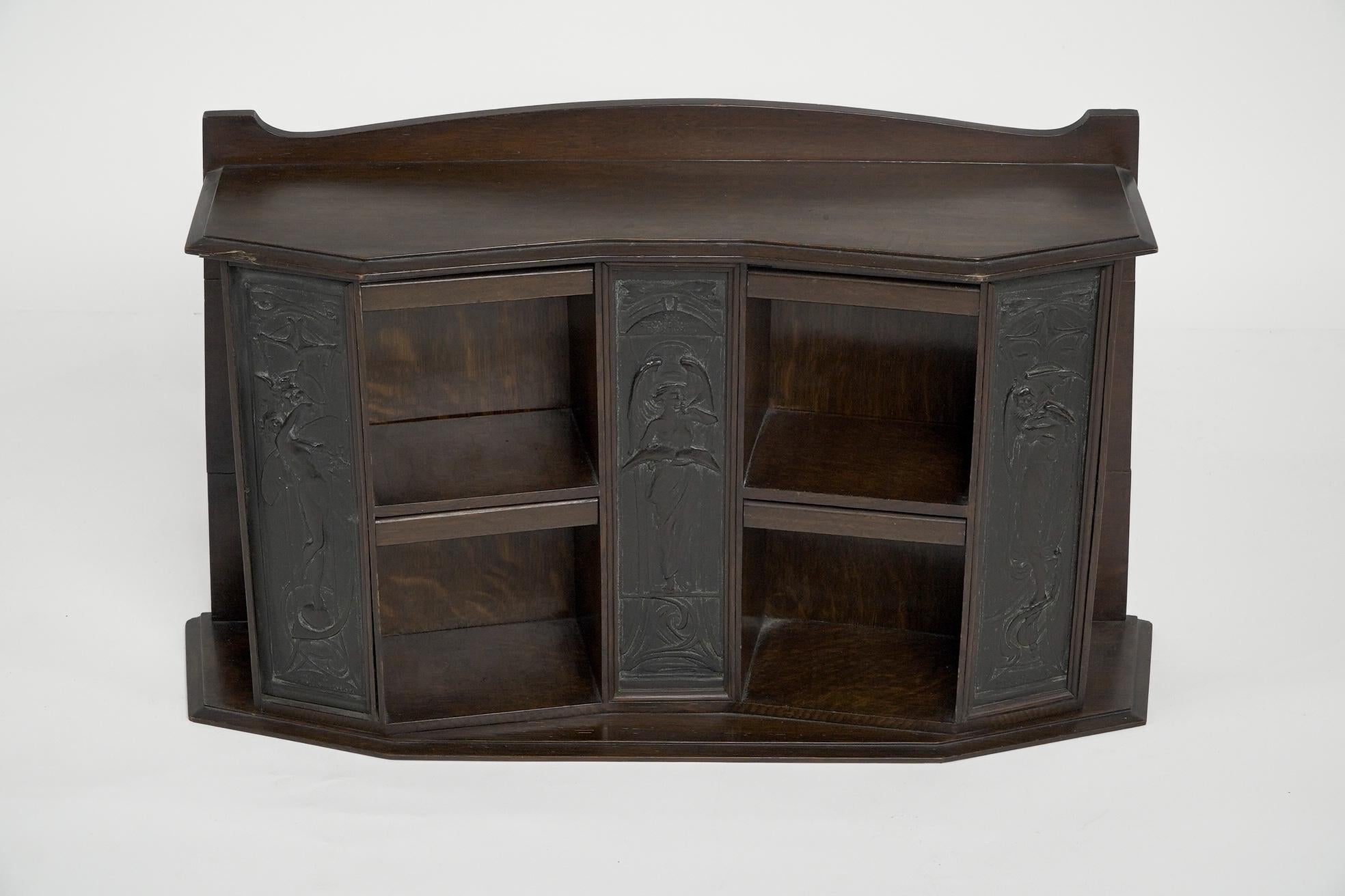 English Arts and Crafts oak desk top bookcase with 3 bronze Art Nouveau period plaques. For Sale